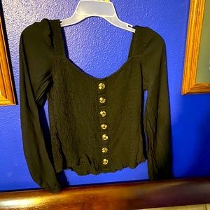 Black top with buttons.